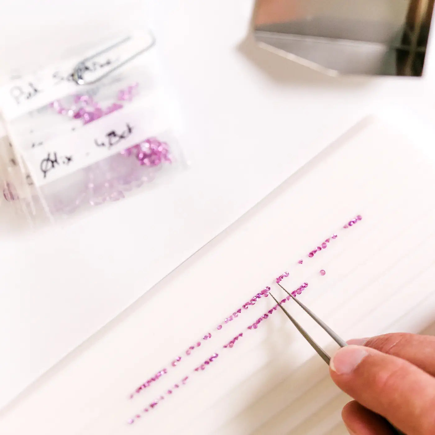 Selecting a line of Round Pink Sapphires for a bracelet