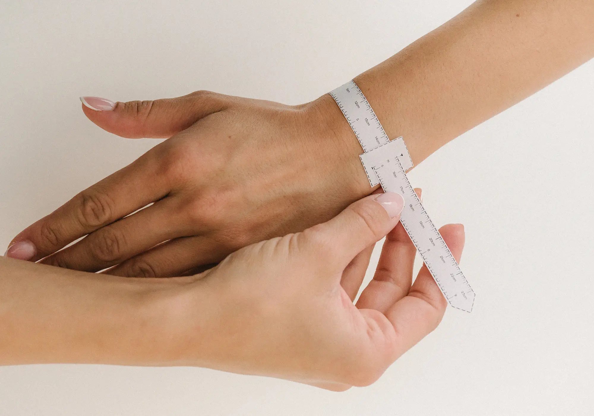 Measuring a wrist with a printable size guide
