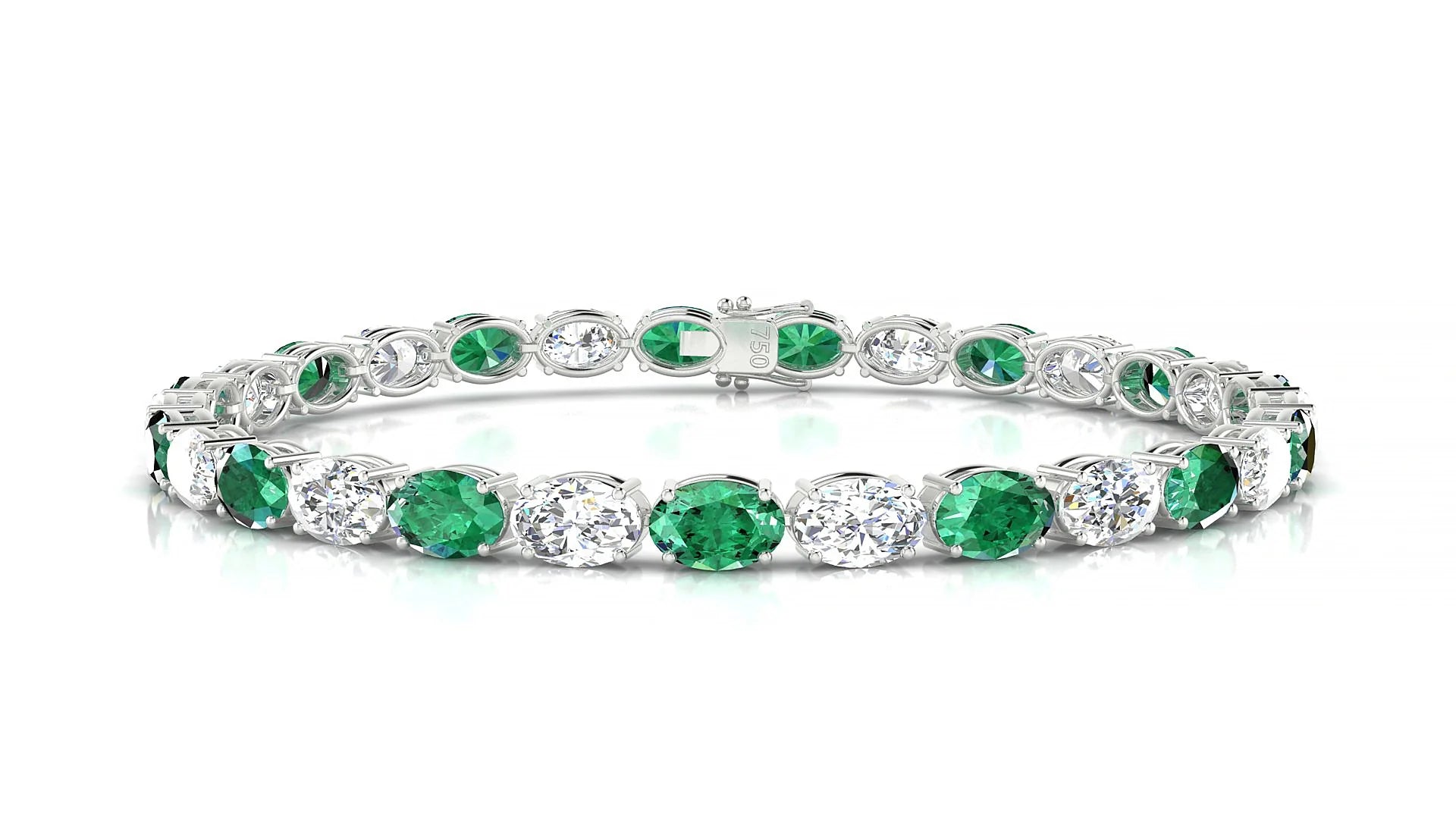 Pula 1-1 | 18k White Gold 6 x 4 mm Oval Natural Emerald & Diamond 18 cm Tennis Bracelet