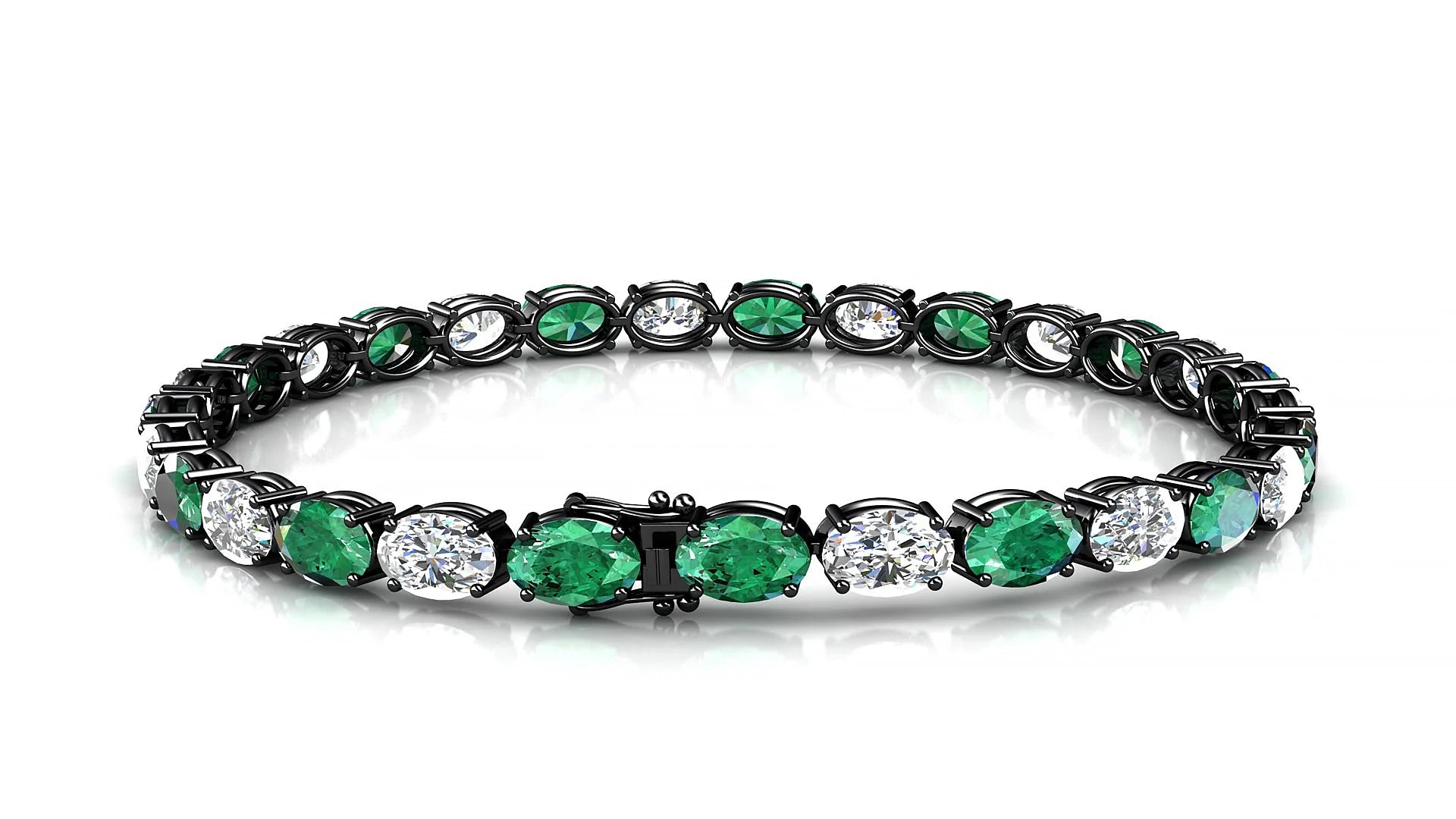 Pula 1-1 | 18k Black Gold 6 x 4 mm Oval Natural Emerald & Diamond 18 cm Tennis Bracelet