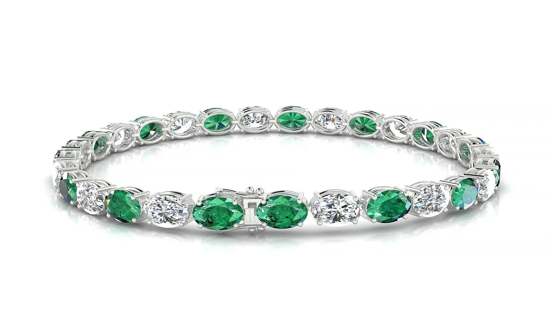 Pula 1-1 | 18k White Gold 6 x 4 mm Oval Natural Emerald & Diamond 18 cm Tennis Bracelet