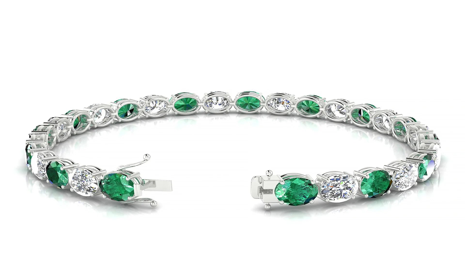 Pula 1-1 | 18k White Gold 6 x 4 mm Oval Natural Emerald & Diamond 18 cm Tennis Bracelet