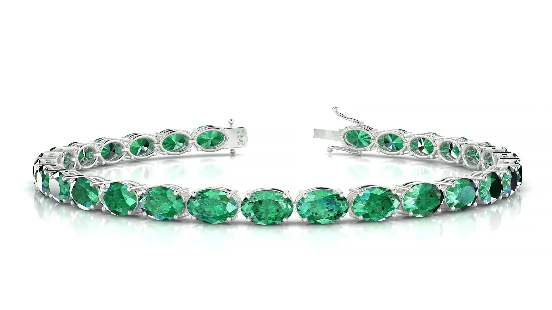 Pula | 18k White Gold 6 x 4 mm Oval Natural Emerald 18 cm Tennis Bracelet