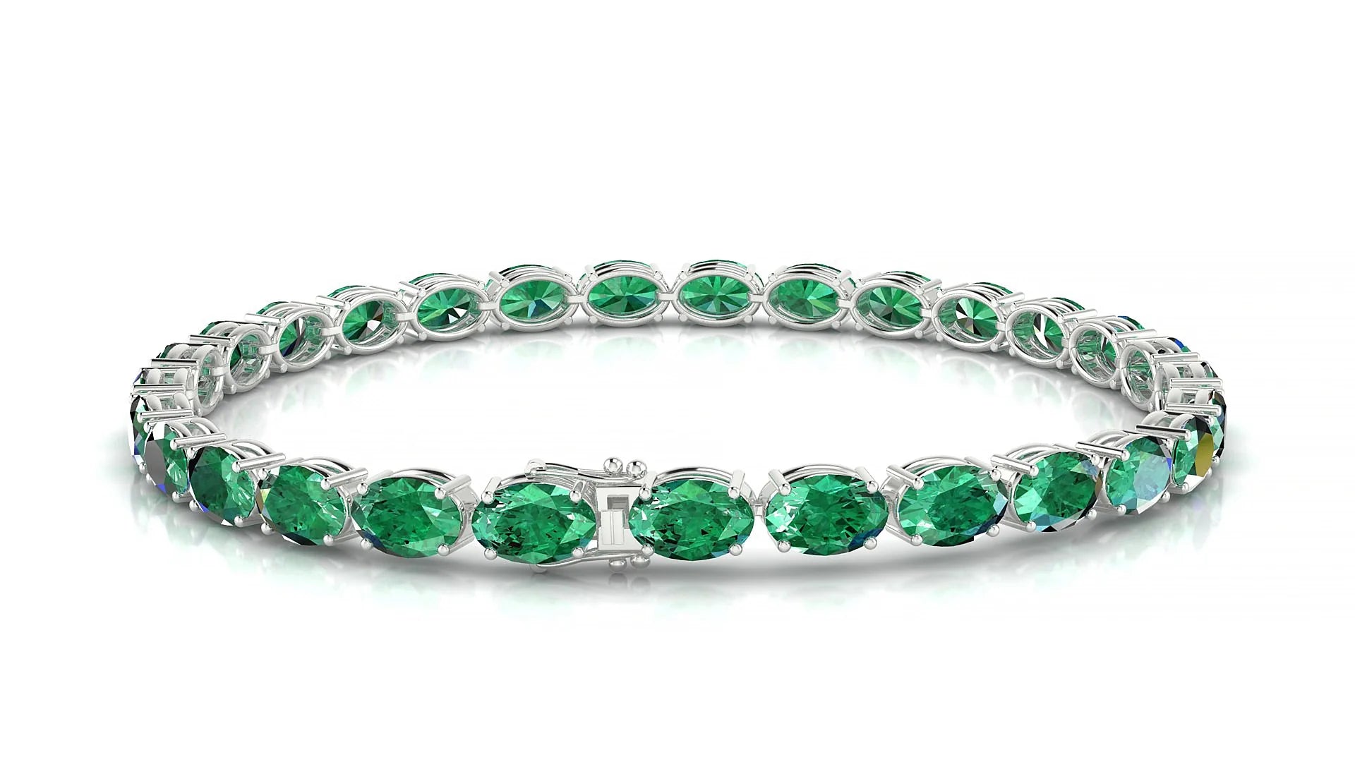 Pula | 18k White Gold 6 x 4 mm Oval Natural Emerald 18 cm Tennis Bracelet