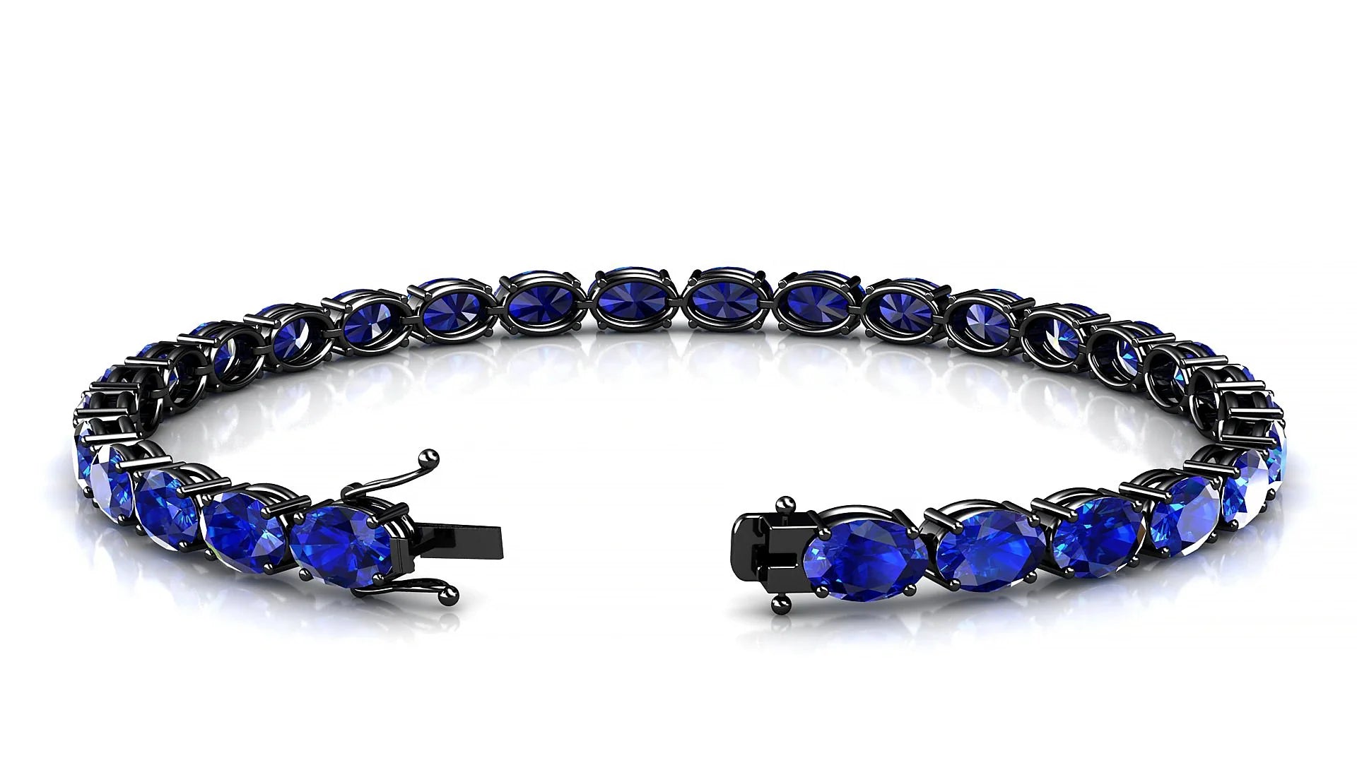 Pula | 18k Black Gold 6 x 4 mm Oval Natural Sapphire 18 cm Tennis Bracelet