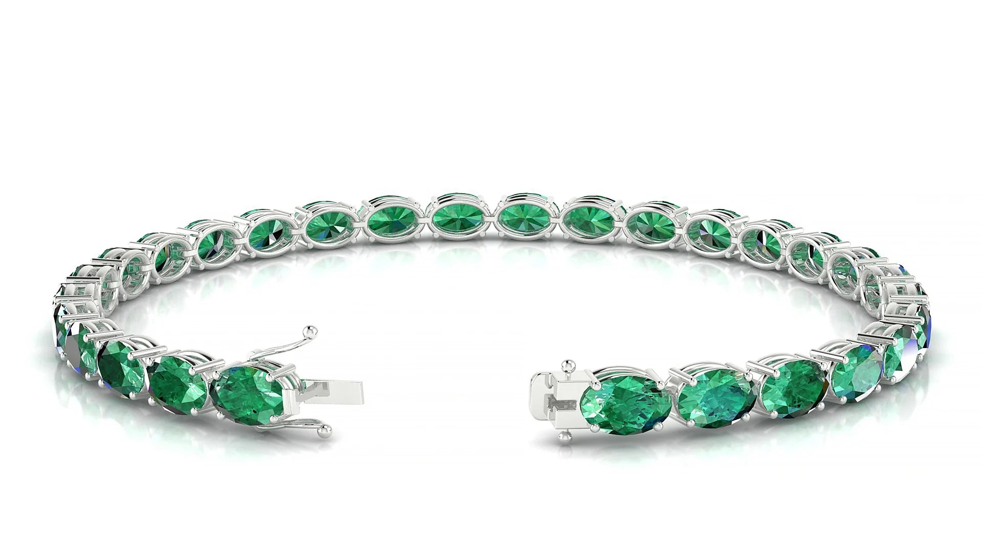 Pula | 18k White Gold 6 x 4 mm Oval Natural Emerald 18 cm Tennis Bracelet